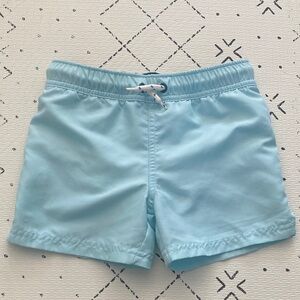 Little Planet swim trunks